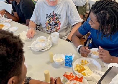 Lee at a cookout with troop members