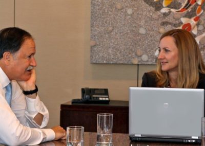 Lee talking with a team member.